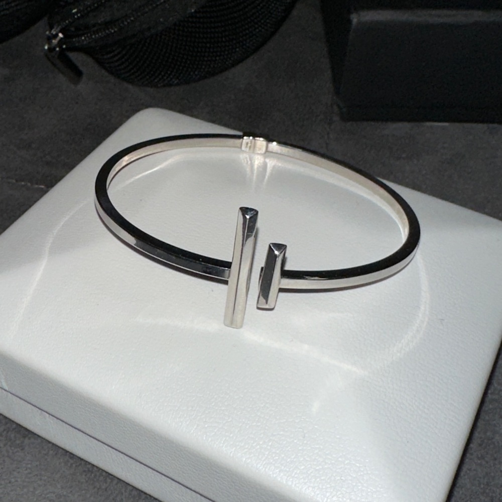 Real silver bangle, worn maybe 3 times - comes with original box and tag